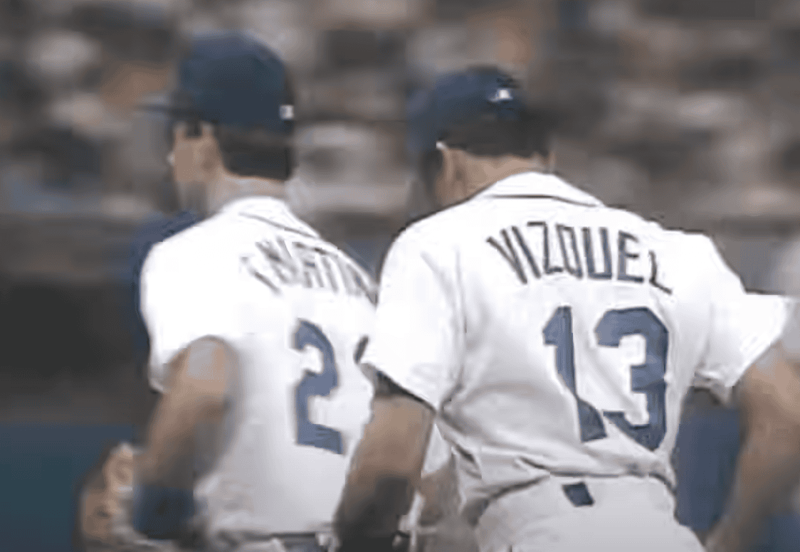 Omar Vizquel making a play, showcasing his talent as a top shortstop in the '90s.